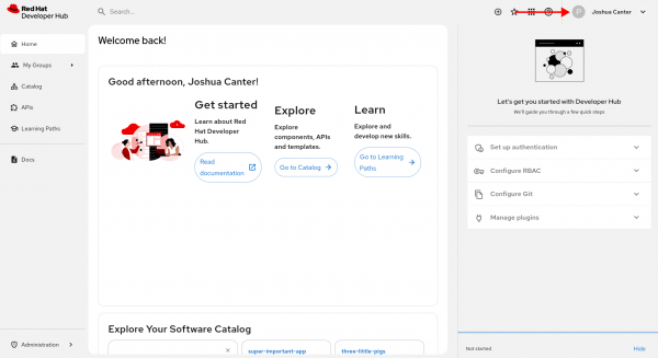 The Red Hat Developer Hub home screen shows a red arrow pointing to the user&rsquo;s name synced from GitHub.