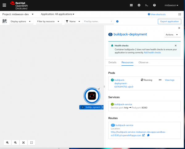 Picutre of the OpenShift topology page with the single deployed application selected and the additional details showing on the right hand side. At the top of the side info, there is a message indicating that there are no health checks for the application and asking if you want to add them