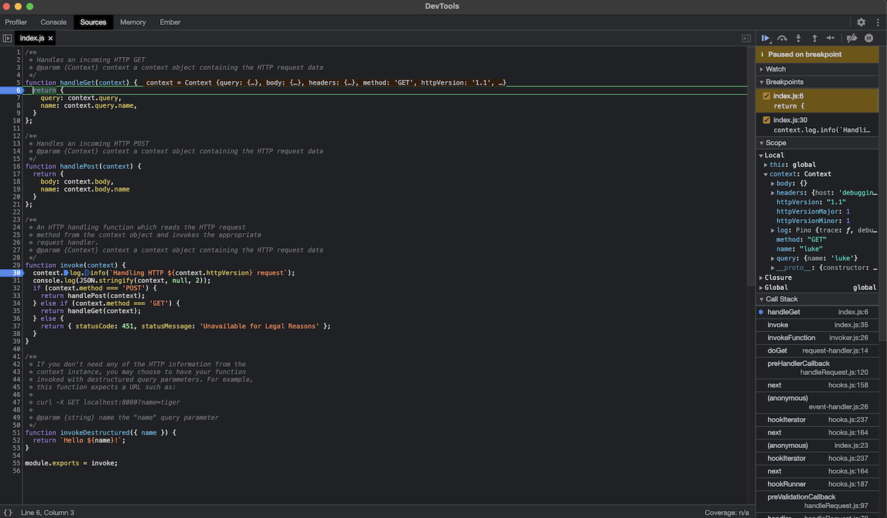 The program stops at the breakpoint in the cluster.