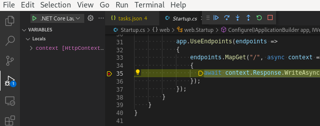 The VS Code debugger has stopped the application at a breakpoint.